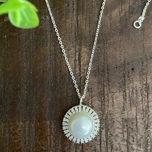 925 Sterling Silver Pearl pendent (10mm) Enhanced with Diamond Moissanite.